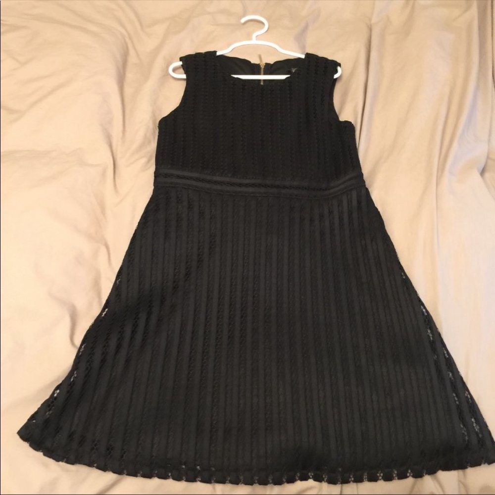 Girl’s simple black dress